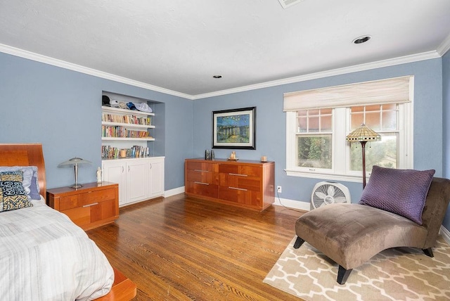 bedroom with crown molding and wood-type flooring