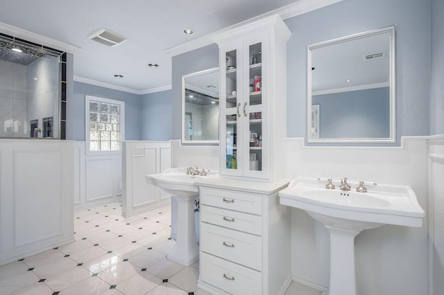 bathroom with crown molding