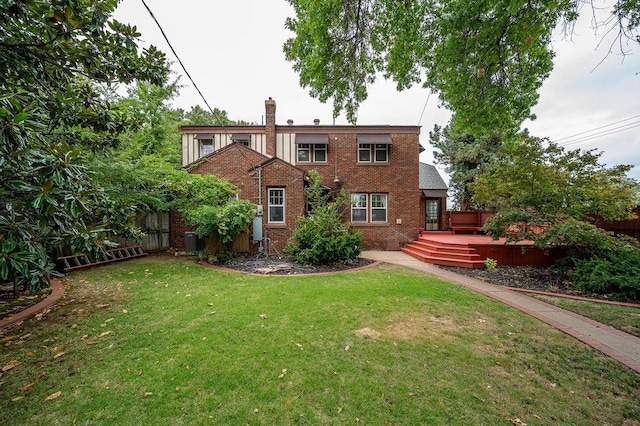 exterior space with a lawn and a deck