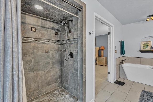 bathroom with plus walk in shower and tile patterned floors