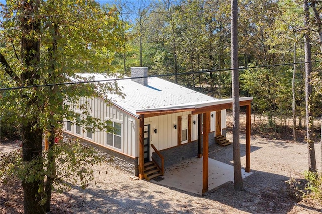 view of front of house with a patio area