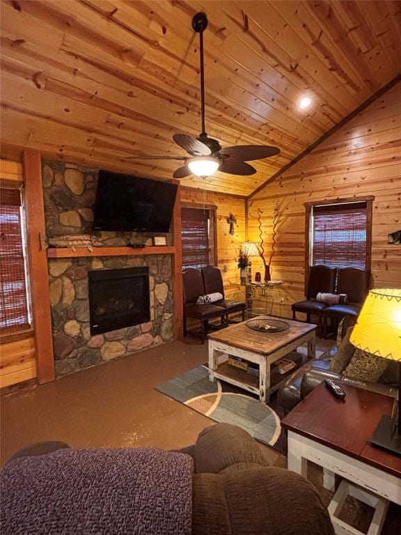 carpeted living room with ceiling fan, wood walls, lofted ceiling, and wood ceiling