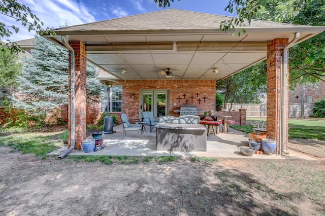 view of patio / terrace with an outdoor hangout area, ceiling fan, and grilling area