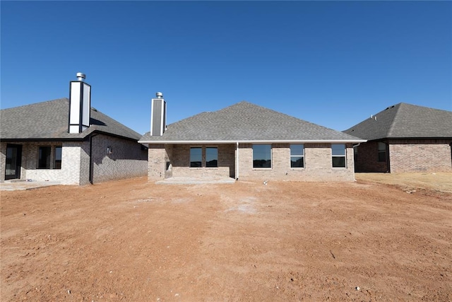 rear view of house with a patio area