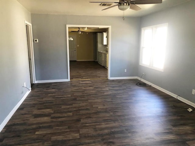 unfurnished room featuring dark hardwood / wood-style floors