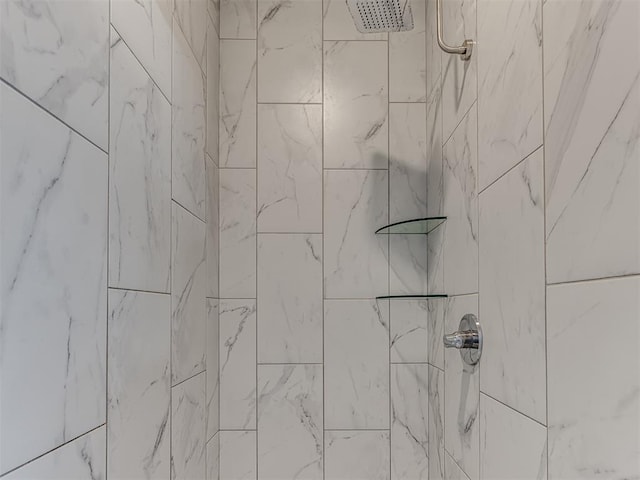 details featuring a tile shower