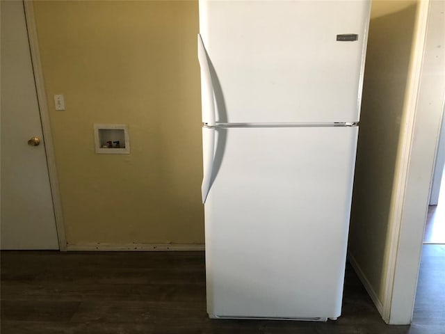 interior space featuring hardwood / wood-style flooring and white fridge