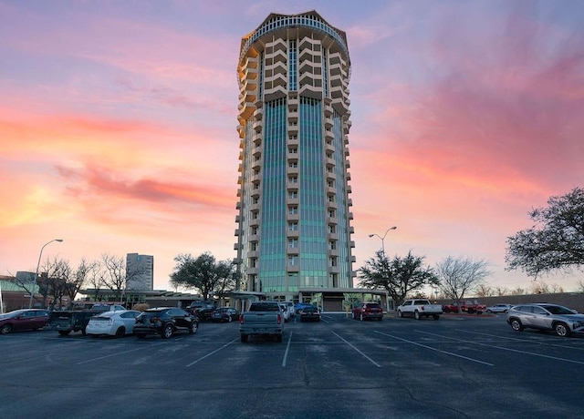 view of outdoor building at dusk