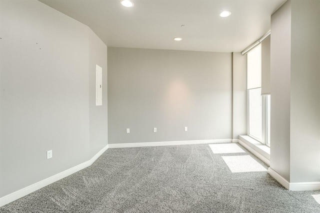 empty room featuring carpet flooring