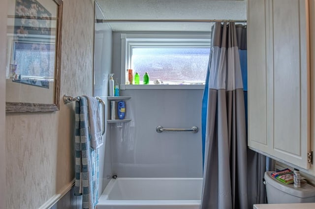 full bath with toilet and shower / tub combo