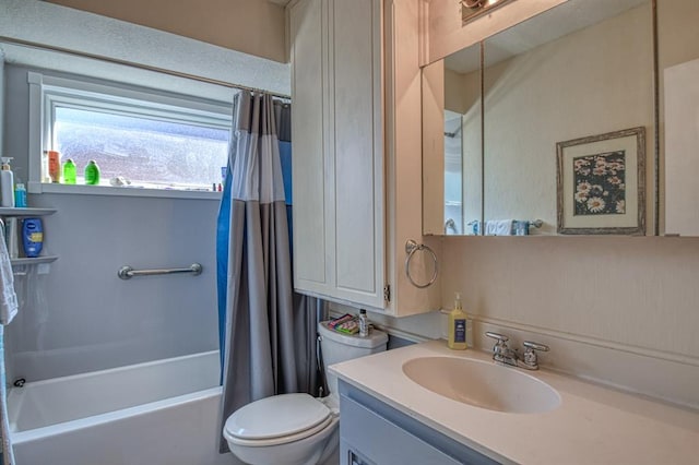 full bathroom with shower / bath combination with curtain, vanity, and toilet