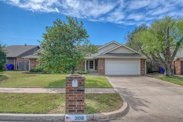 ranch-style house with a garage, a shingled roof, concrete driveway, a front lawn, and brick siding