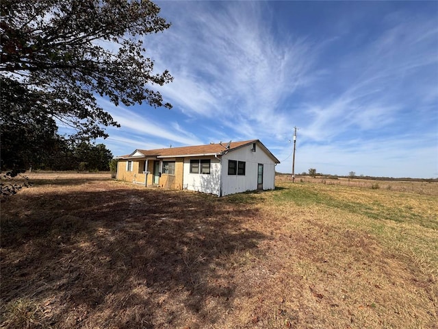 exterior space with a lawn