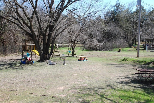 view of yard featuring a playground