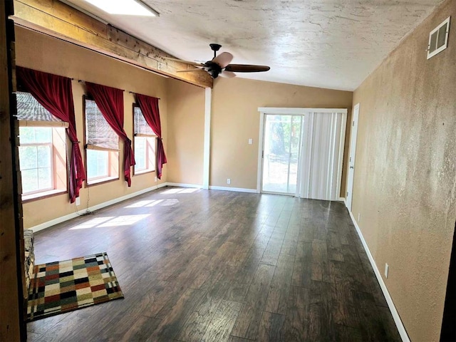 unfurnished room with dark hardwood / wood-style flooring, ceiling fan, and lofted ceiling