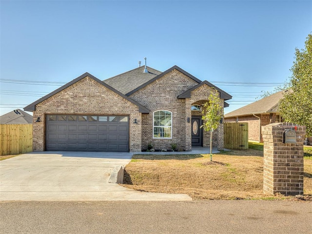 view of front of property featuring a garage