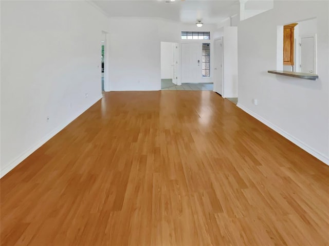 unfurnished living room with light hardwood / wood-style floors