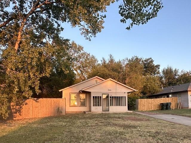 view of front of home with a front yard