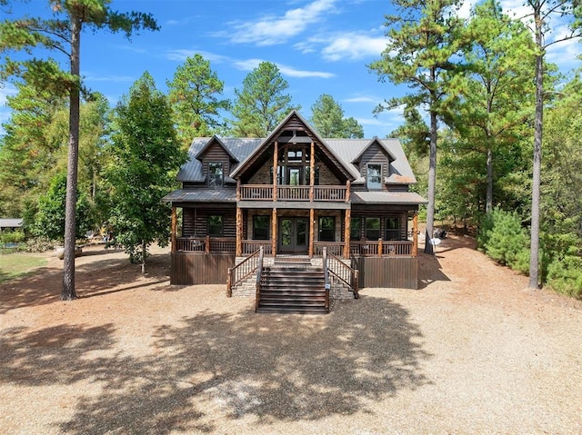 log cabin featuring a porch