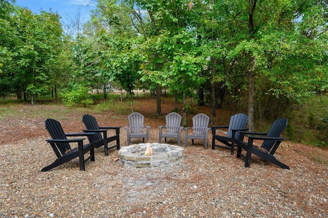 view of patio with a fire pit