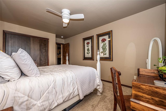 bedroom with ceiling fan and light colored carpet