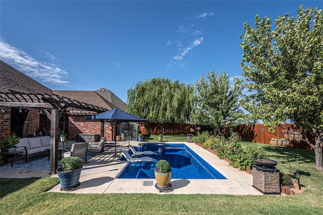 view of swimming pool featuring outdoor lounge area, a patio, a pergola, and a lawn