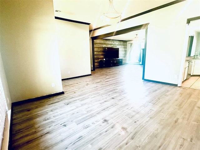 16355 Cobblestone Cir, Choctaw, OK 73020 - unfurnished living room featuring light wood-style flooring, ceiling fan, and a towering ceiling