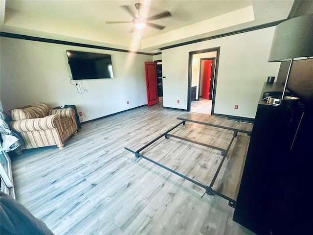16355 Cobblestone Cir, Choctaw, OK 73020 - living area with a ceiling fan, wood finished floors, and a raised ceiling