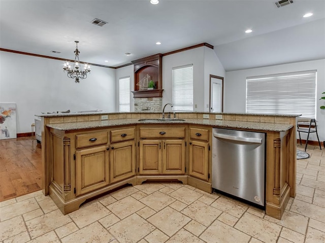 kitchen featuring dishwasher, a kitchen island with sink, a notable chandelier, and sink