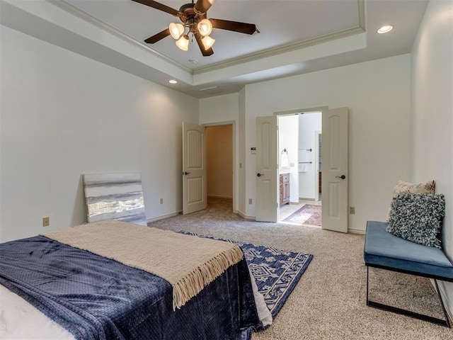 carpeted bedroom featuring a raised ceiling, ceiling fan, and crown molding