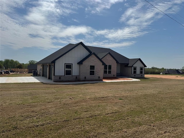 modern farmhouse style home with an attached garage, a front lawn, brick siding, board and batten siding, and concrete driveway