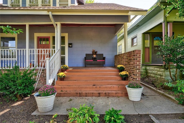 entrance to property with a porch