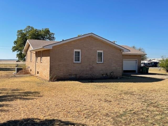 view of property exterior featuring a garage