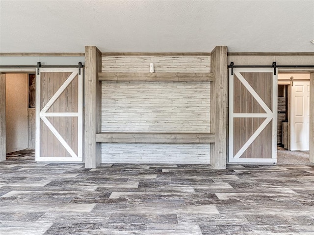 interior details with a barn door