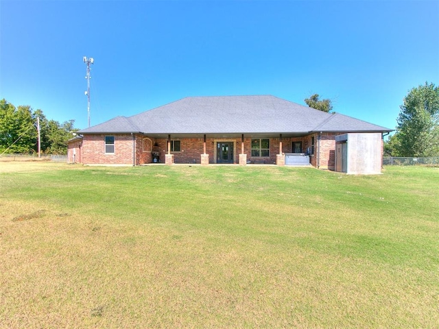 view of front of house with a front lawn