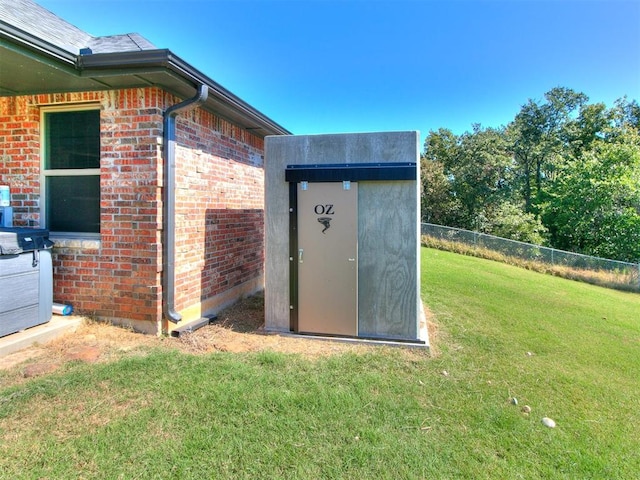 view of outdoor structure featuring a yard