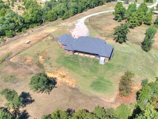 birds eye view of property with a rural view