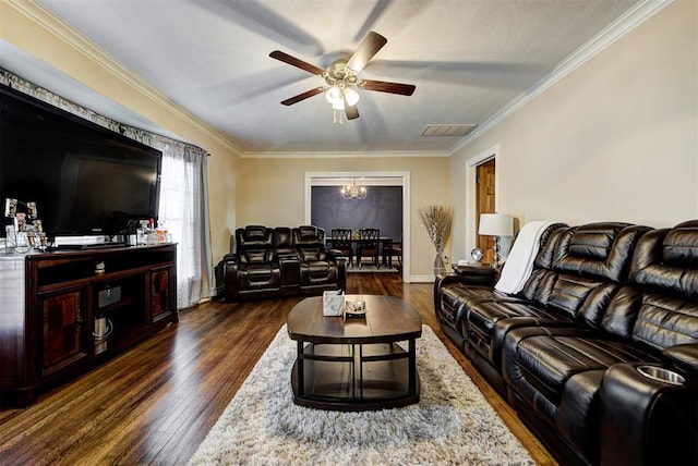 living room with ceiling fan with notable chandelier, dark hardwood / wood-style floors, and crown molding