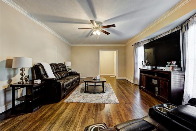 living room with ceiling fan, dark hardwood / wood-style floors, and ornamental molding