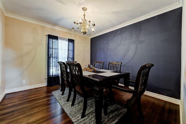 dining area with a notable chandelier, dark hardwood / wood-style flooring, and ornamental molding