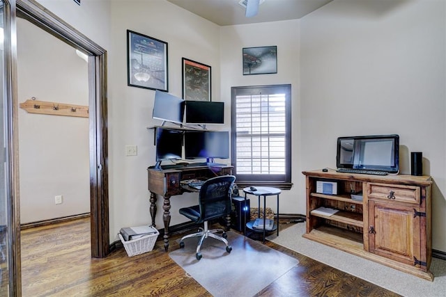 office with hardwood / wood-style flooring