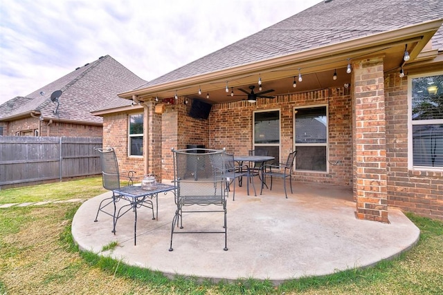 view of patio featuring ceiling fan