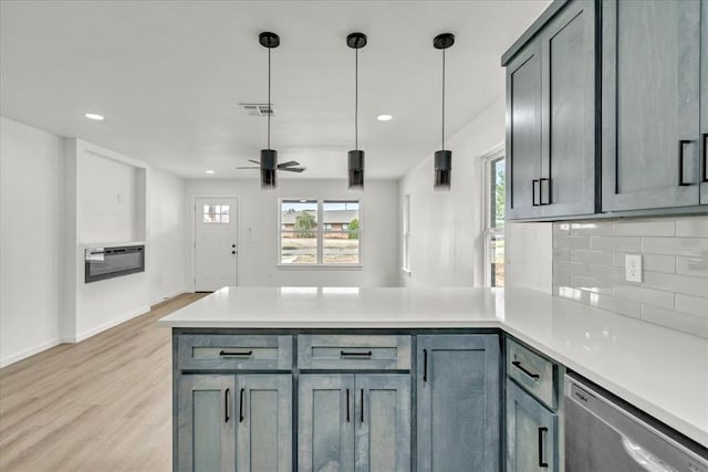 kitchen with ceiling fan, dishwasher, light hardwood / wood-style flooring, pendant lighting, and gray cabinets