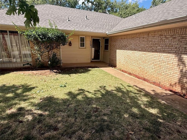 exterior space featuring a yard