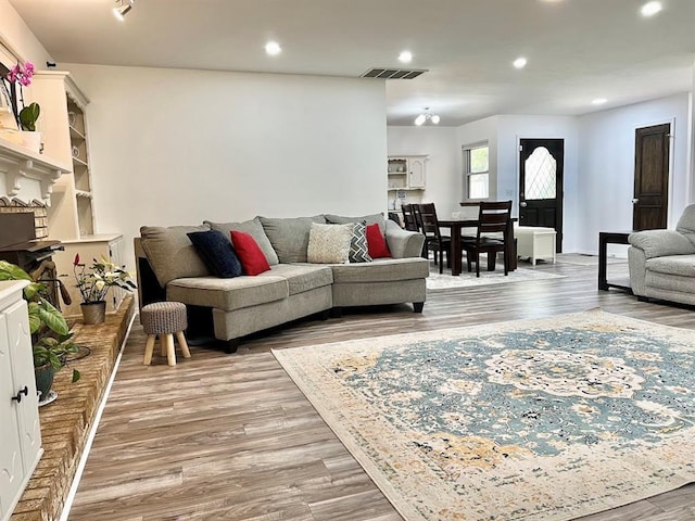 living room with hardwood / wood-style floors