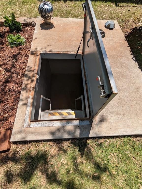 view of entry to storm shelter