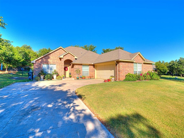 single story home featuring a front lawn and a garage