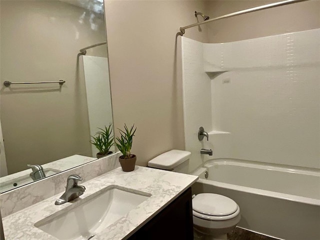 full bathroom with vanity, shower / bathtub combination, and toilet