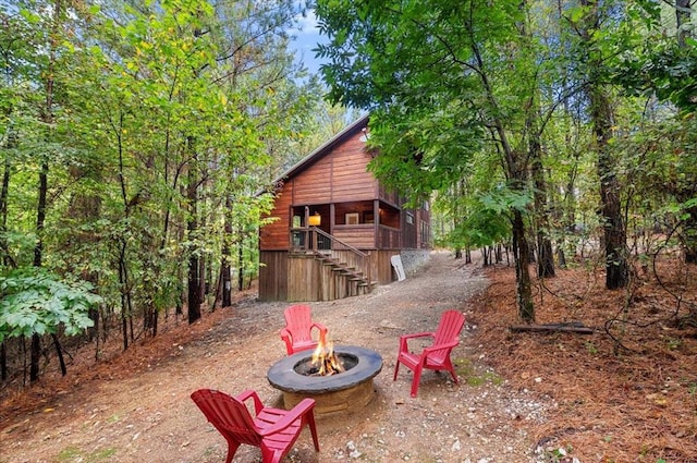 view of patio / terrace with an outdoor fire pit