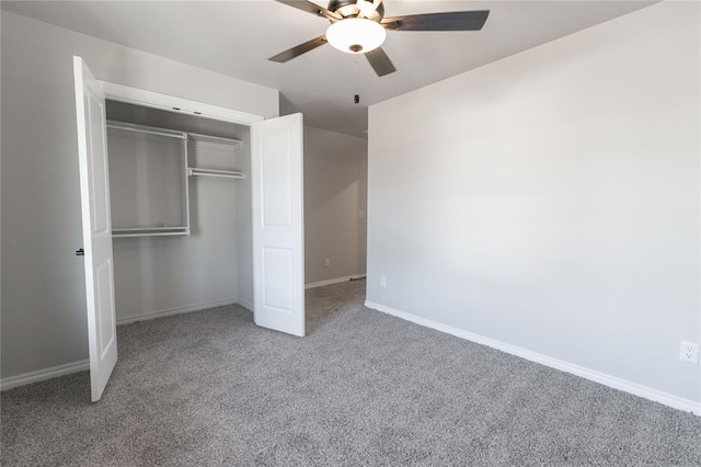 unfurnished bedroom featuring a ceiling fan, carpet, a closet, and baseboards